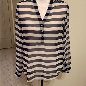 The limited navy and cream blouse